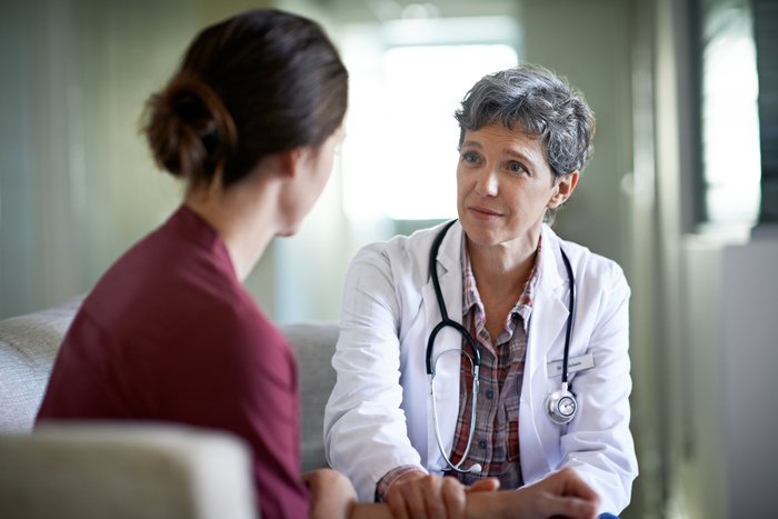 Stock image of a doctor explaining to patient